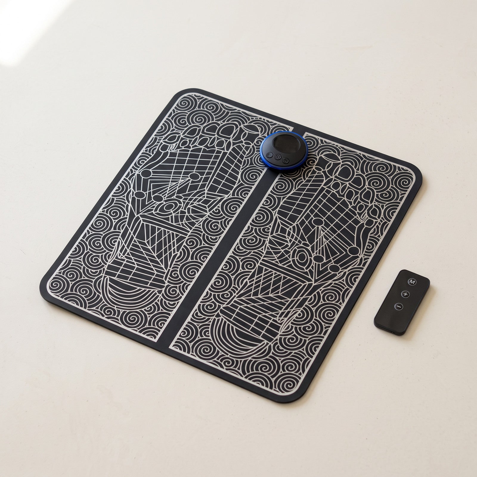 Whole FootPause mat with its remote