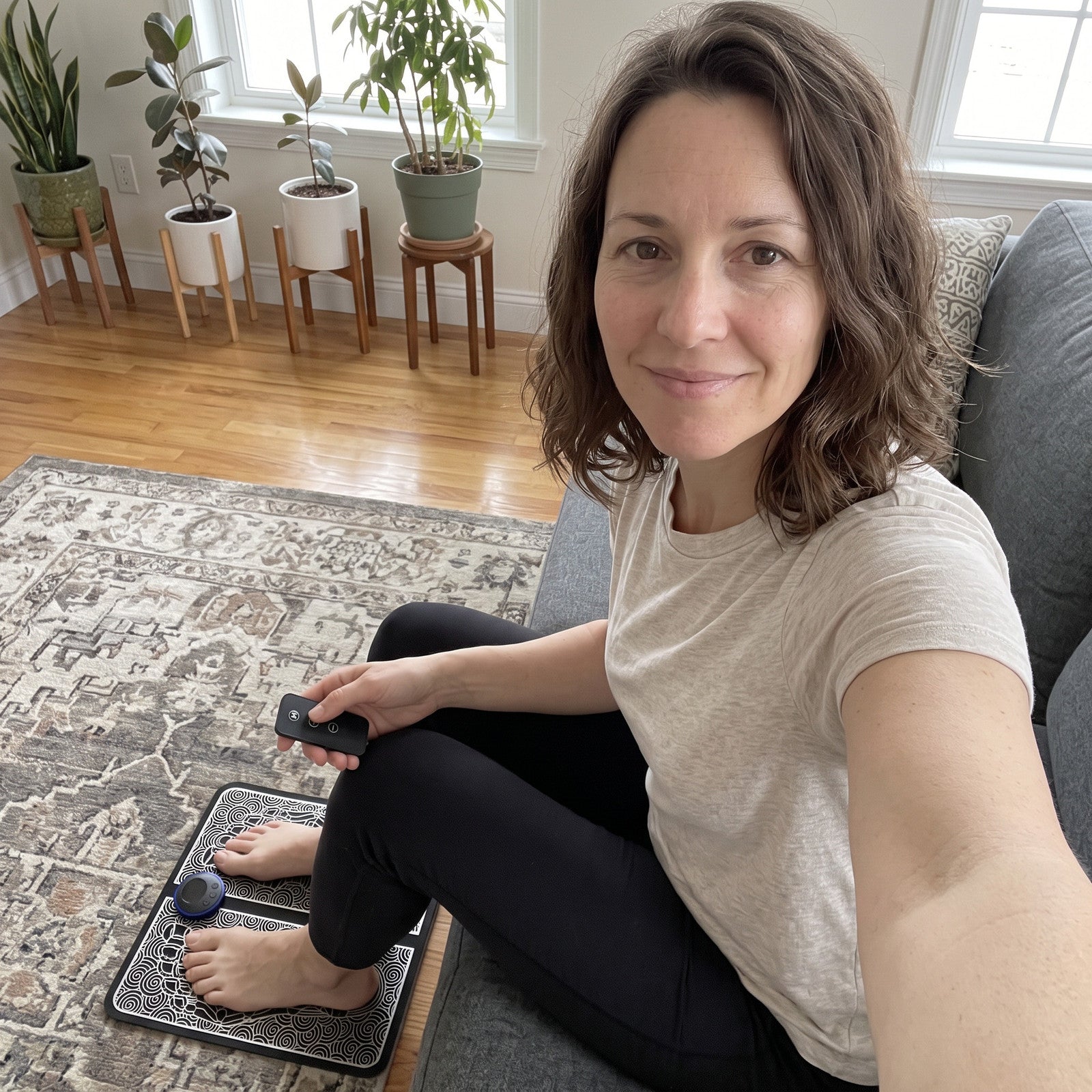Hannah sofa selfie with bare feet on FootPause